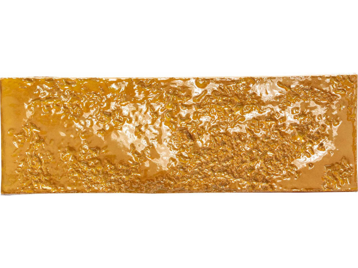 На изображении товар Mutina Керамическая плитка Chamotte Mono Ocra 7,5x21,3 от официального представителя в Москве