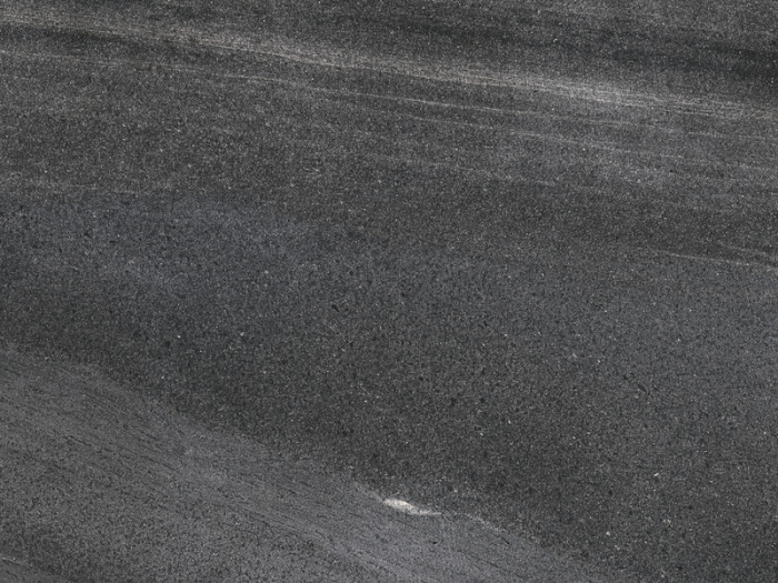 На изображении товар FMG Active surface Керамогранит Pietra di basalto Basalto nero active 120x60 от официального представителя в Москве